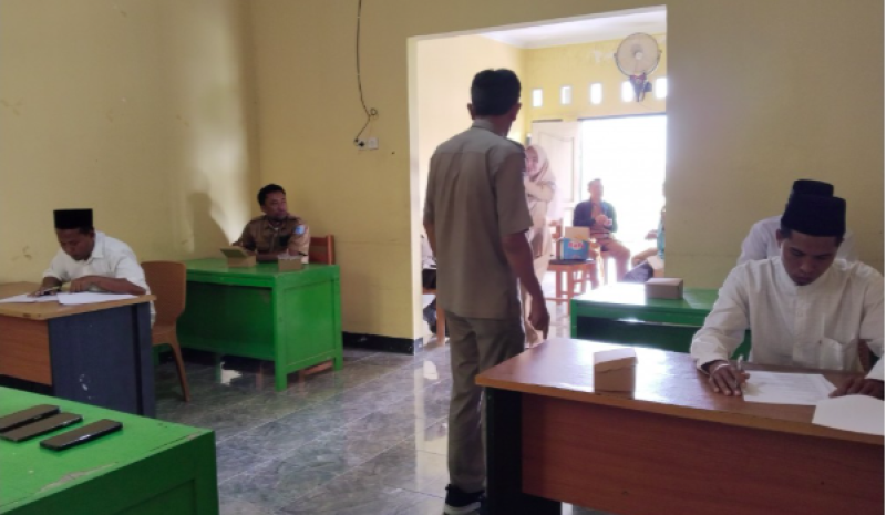 Pelaksanaan  Ujian  Tulis  Calon  Perangkat  Desa  ( Kepala Dusun)  Desa  Giri  Tembesi